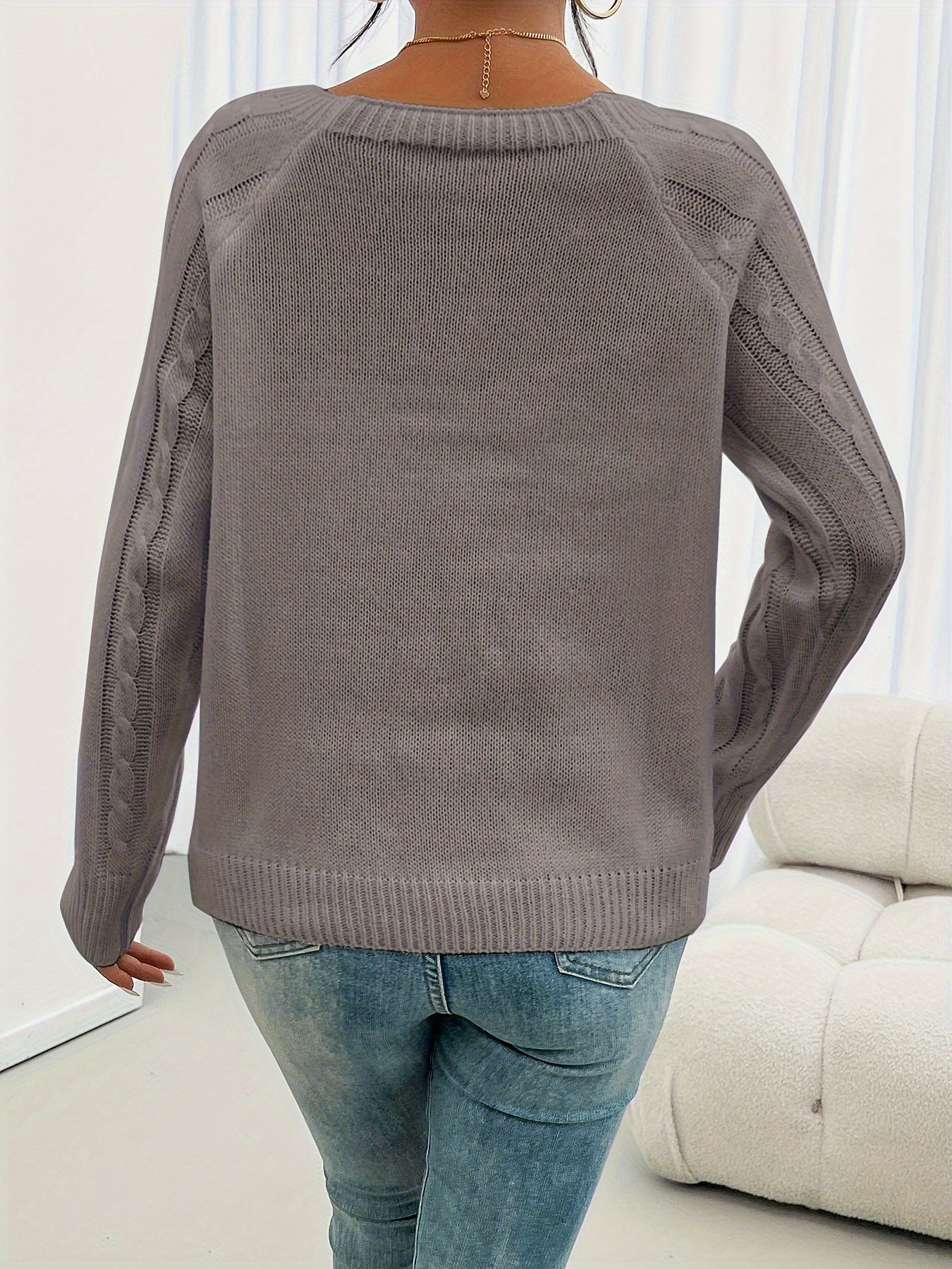 Taupe crewneck knit sweater, back view, with ribbed hem and long sleeves