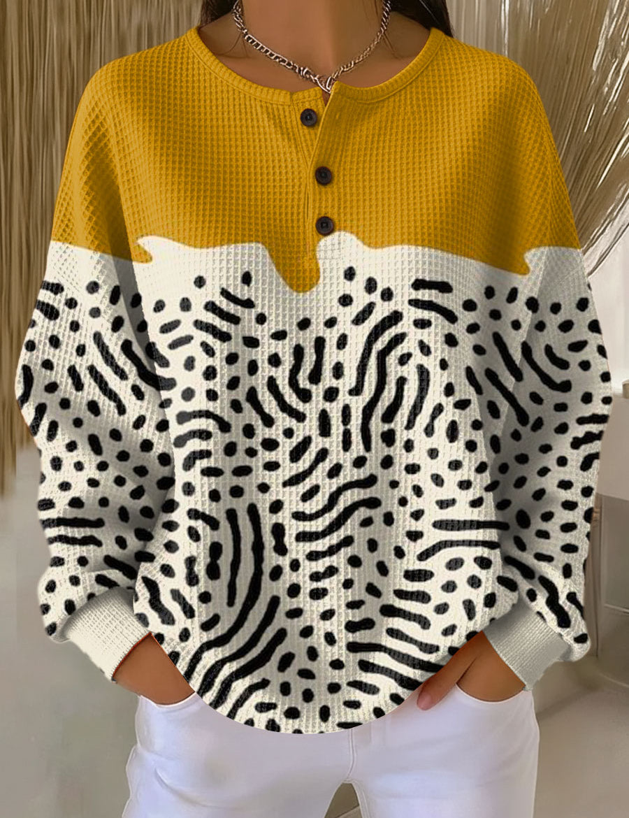 Liv™ knit henley sweater in mustard yellow, cream, with black abstract print