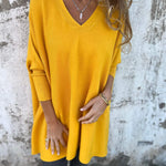 Mustard yellow V-neck pullover sweater with three-quarter sleeves and soft drape.