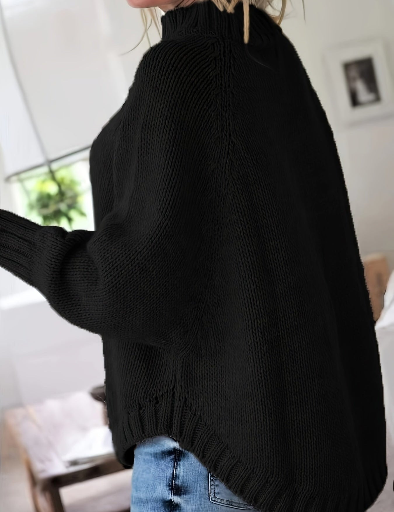Black cable-knit vintage pullover with turtleneck, long sleeves, ribbed cuffs