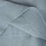 Light blue ribbed knit fabric detail on a fair isle pullover sleeve