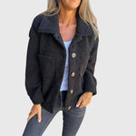 Black sherpa jacket with button front and patch pockets