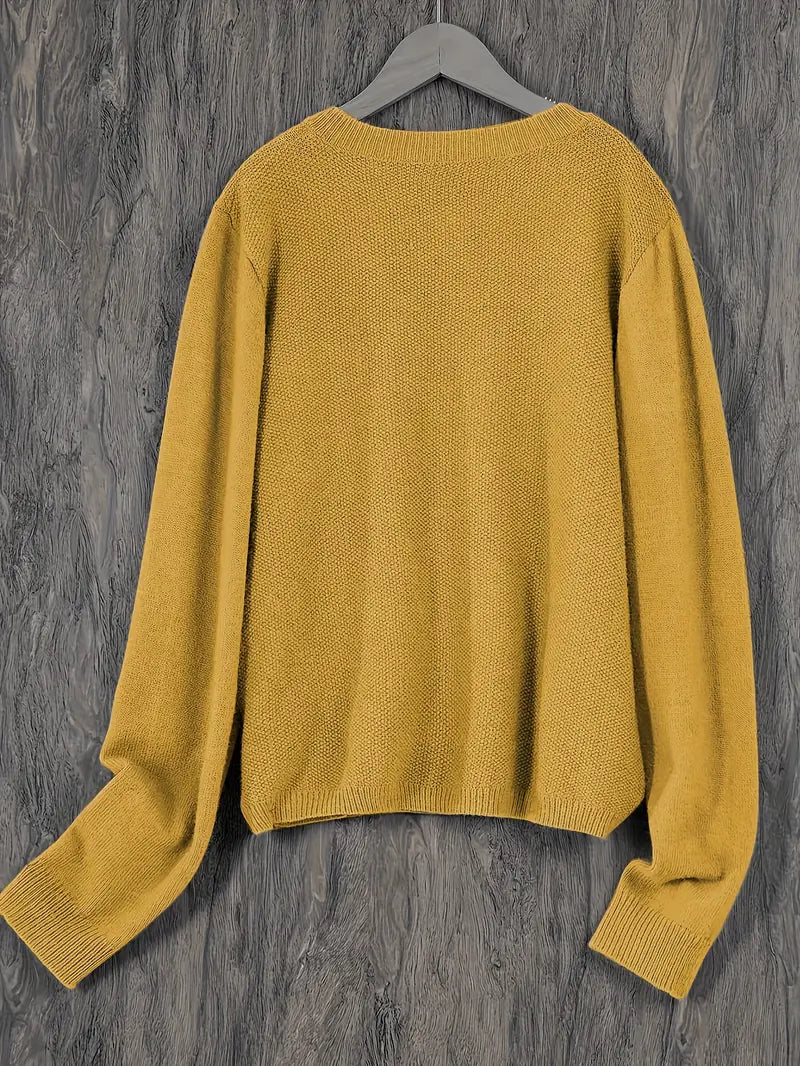 Women’s round-neck cardigan with long sleeves, mustard yellow knit texture, cropped back view