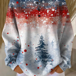 Christmas sweater with soft knit tree pattern, long sleeves, red and blue accents