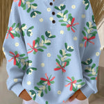 Light blue waffle-knit pullover with Christmas floral print and button placket