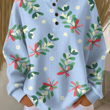 Light blue waffle-knit pullover with Christmas floral print and button placket