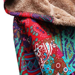 Remi™ patchwork jacket close-up with beige sherpa lining and colorful floral patterns