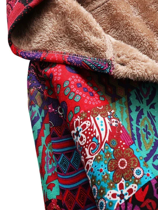 Remi™ patchwork jacket close-up with beige sherpa lining and colorful floral patterns