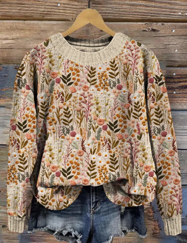 Women’s floral knit pullover with crew neck, ribbed cuffs, and long sleeves