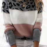 Leopard colorblock pullover sweater in cream, dark gray, and blush-pink panels