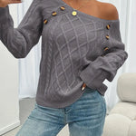 Cable-knit long-sleeve sweater, dark gray, one-shoulder drape with gold button at neckline
