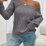Cable-knit long-sleeve sweater, dark gray, one-shoulder drape with gold button at neckline