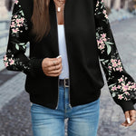 Black zip-up floral print jacket, ribbed cuffs, long sleeves and zip front