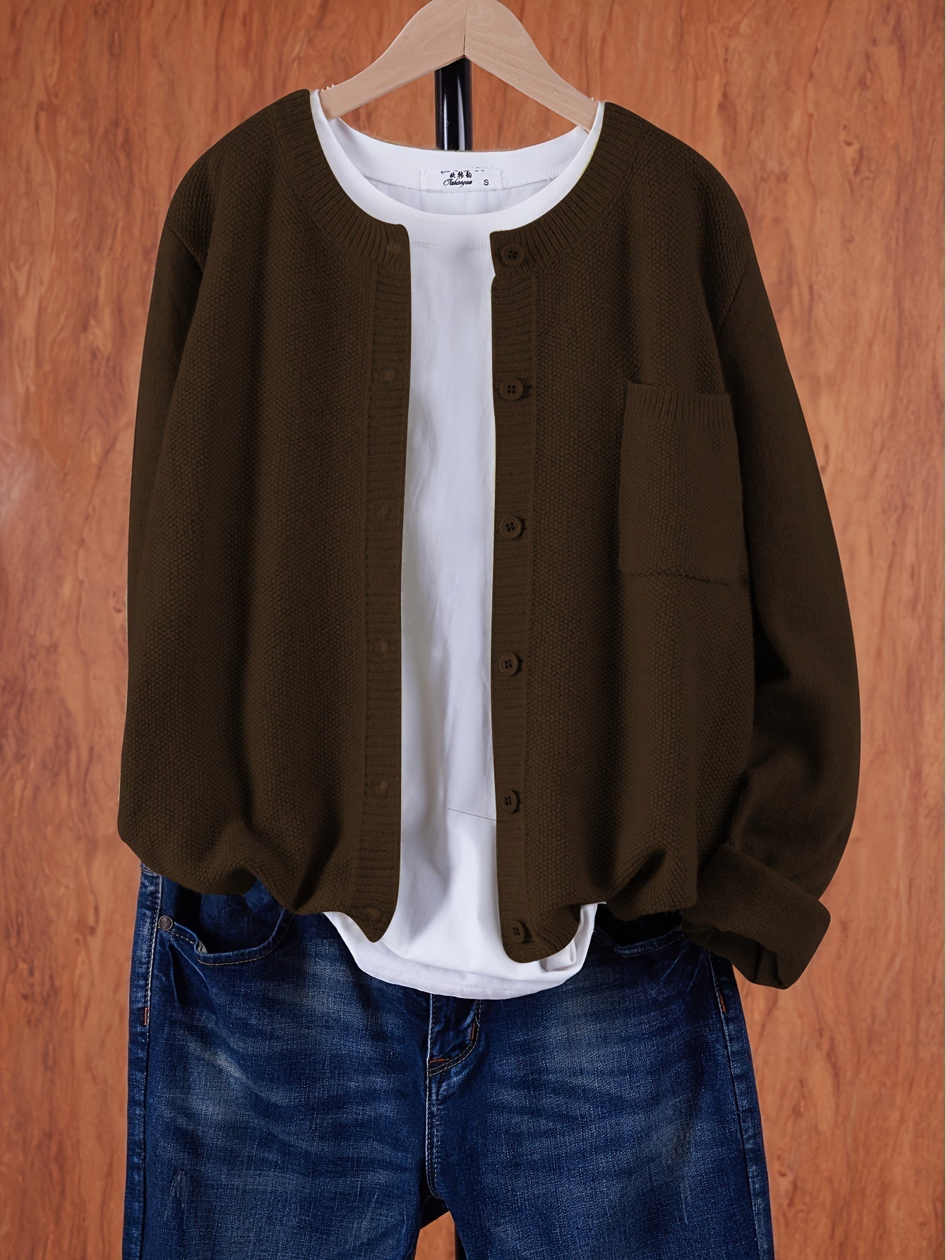 Dark brown round-neck cardigan with button front and side pocket
