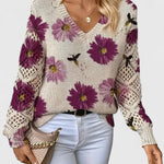 Relaxed floral pullover sweater, cream knit with purple flower print, V-neck, long sleeves