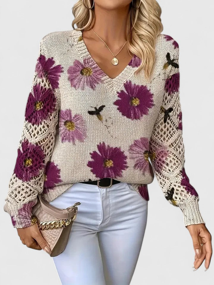 Relaxed floral pullover sweater, cream knit with purple flower print, V-neck, long sleeves