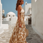 Beige floral satin maxi dress with halter straps and flowing full skirt