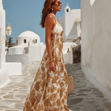 Beige floral satin maxi dress with halter straps and flowing full skirt