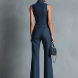 Dunkelblauer, ärmelloser Jumpsuit im Retro-Stil für Damen mit Stehkragen, ausgestelltem Schnitt und Reißverschluss vorne.