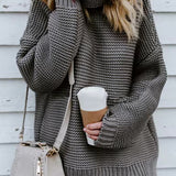Grey roll-neck knitted sweater with long sleeves and ribbed hem and cuffs.