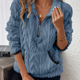 Blue fuzzy quarter-zip pullover with short sleeves and navy-trim accents