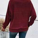 Burgundy striped knit pullover with batwing sleeves, ribbed cuffs and hem