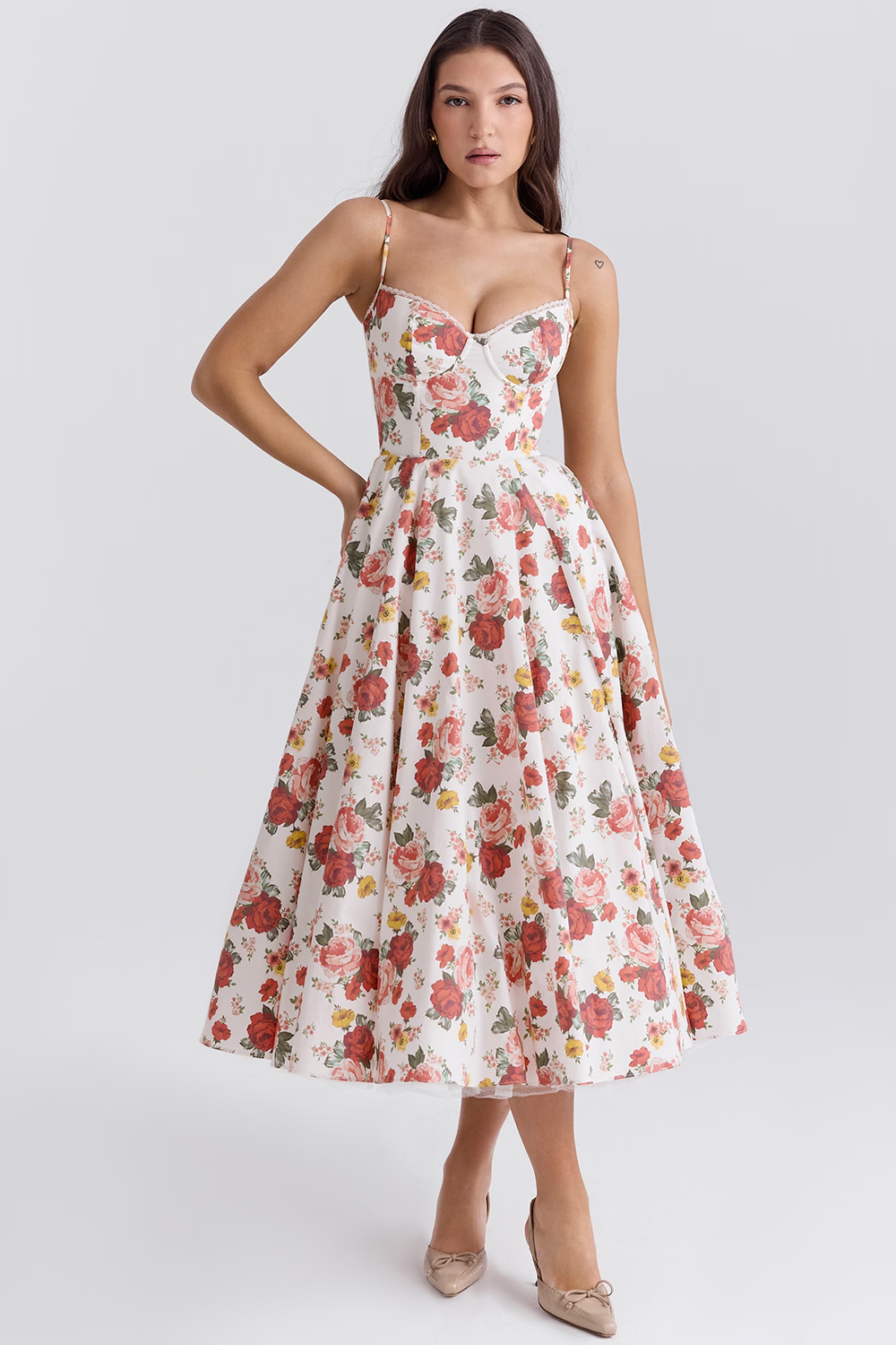 Women's white floral fitted slimming dress with spaghetti straps and flared midi skirt