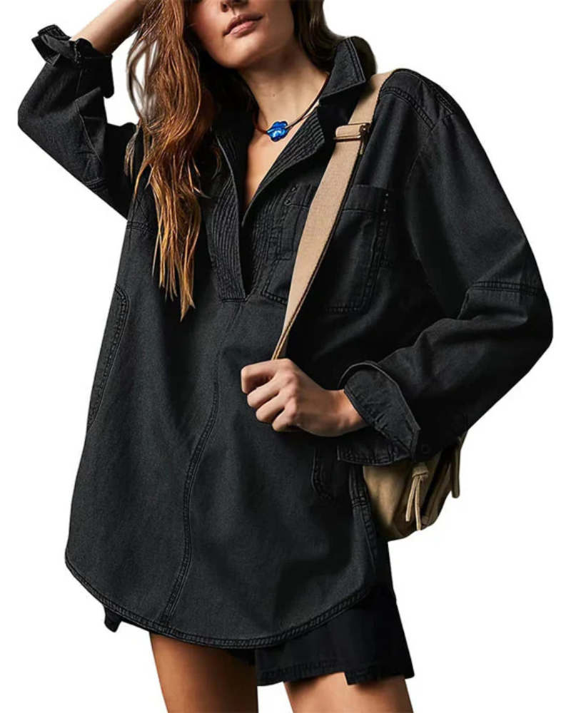 Black oversized denim pullover with half-zip neckline and chest pocket