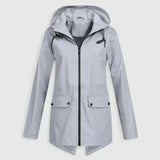 Light gray hooded zip-up jacket with drawstring, front pockets, and buttoned flap closures