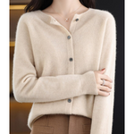 Cream knit pullover with button-front V-neck and long sleeves