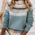 Light blue knit pullover with fair isle yoke, crew neck and long sleeves
