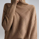 Tan ribbed turtleneck sweater with diamond knit panels and long sleeves