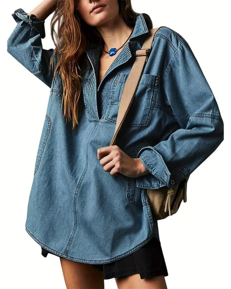 Light blue oversized denim pullover with half-zip and patch sleeve pocket