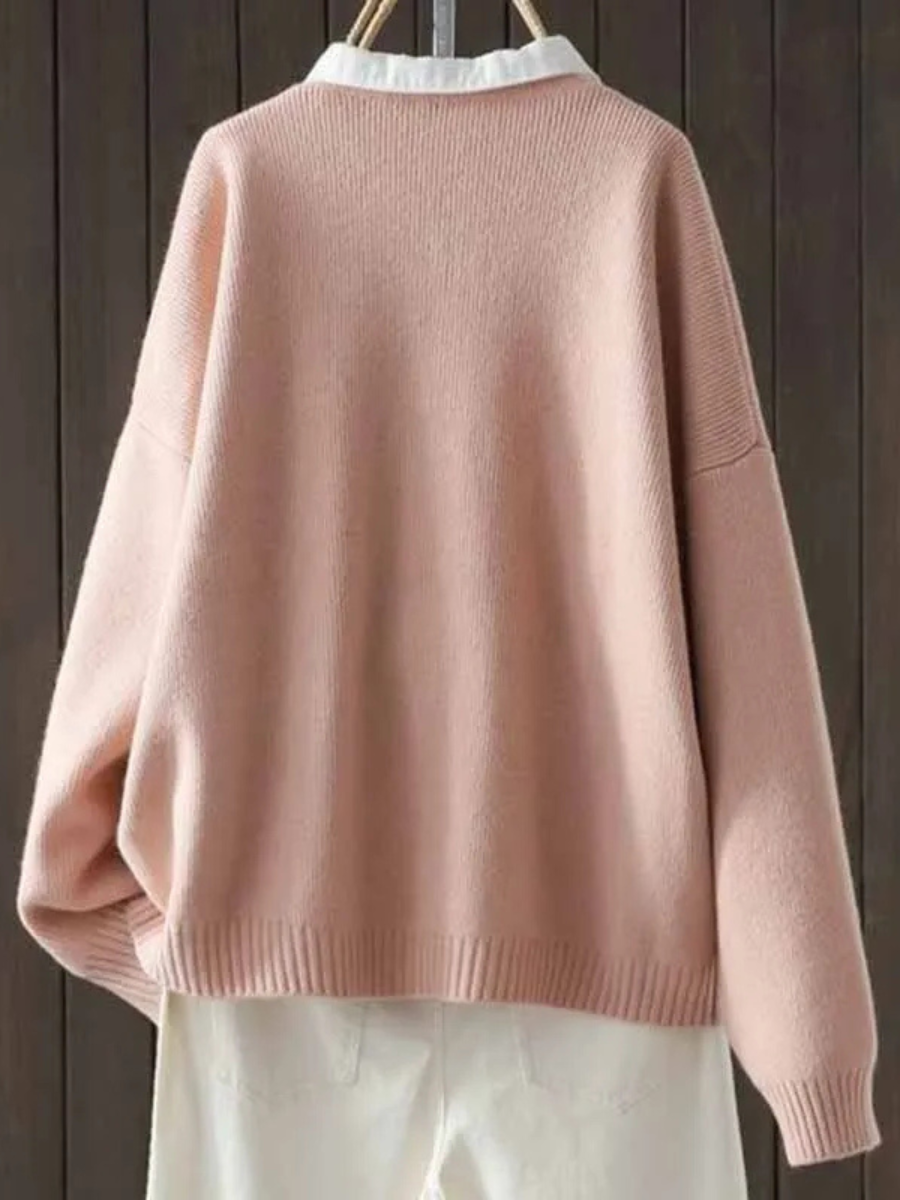 Light pink knit cardigan sweater back view with ribbed hem and cuffs