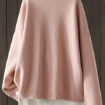 Light pink knit cardigan sweater back view with ribbed hem and cuffs