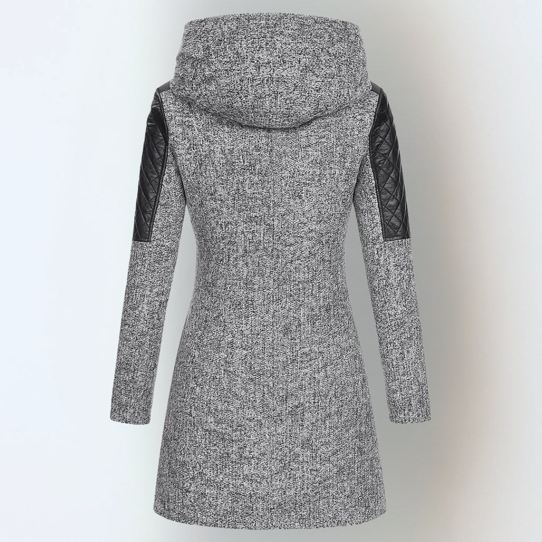 Women’s winter parka coat in light gray, back view, quilted sleeves, attached hood.