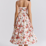 Women's white floral slimming dress with racer back and gathered flared midi skirt
