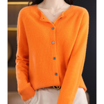 Orange button-front knit pullover with long sleeves and crew neck opening