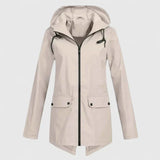 Cream hooded zip-up jacket with drawstring, front pockets, and buttoned flap closures