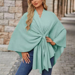 Aqua blue draped poncho with V-neck and gathered front knot, wide cape sleeves