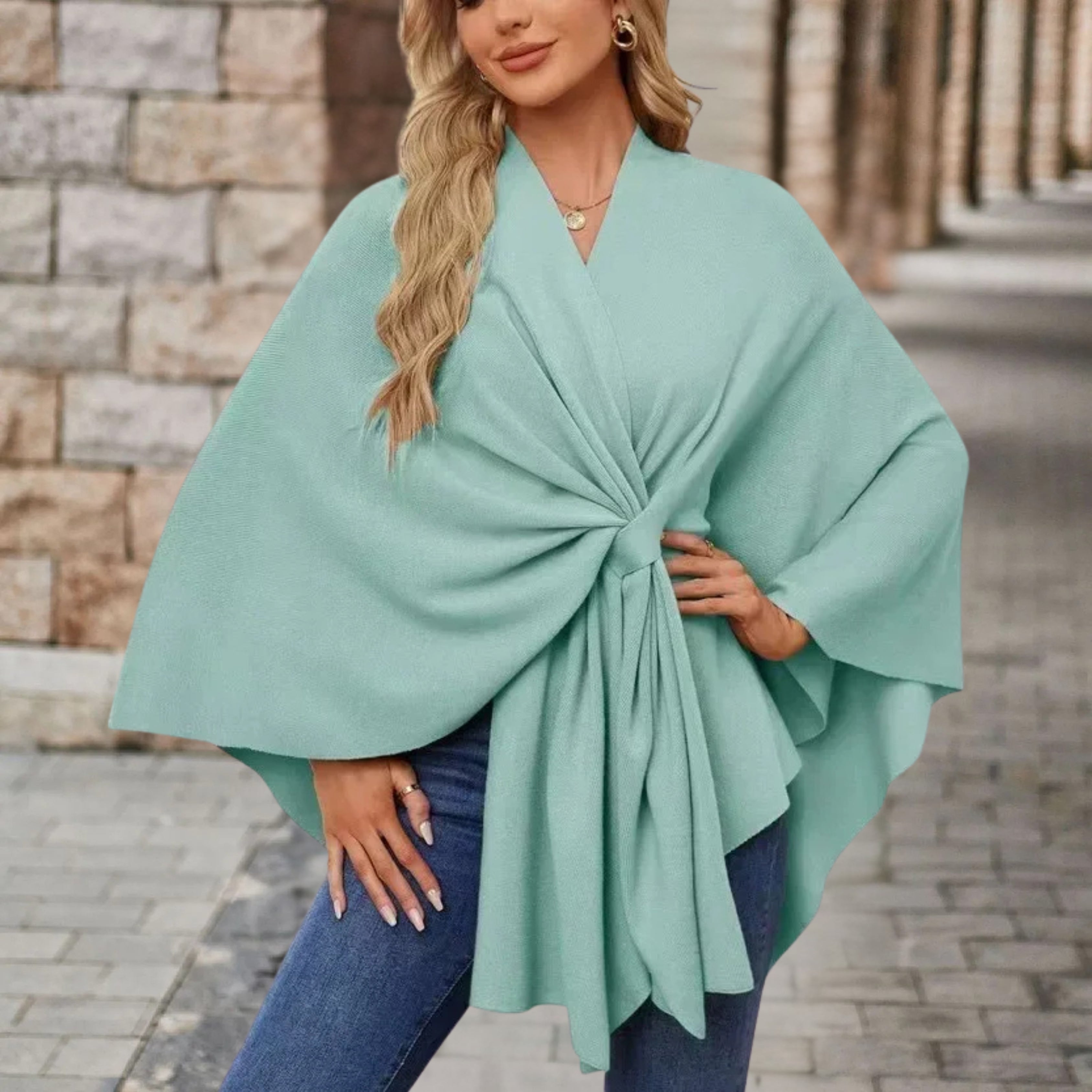 Aqua blue draped poncho with V-neck and gathered front knot, wide cape sleeves
