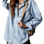 Light blue oversized denim pullover with half-zip collar and front patch pockets