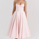 Blush pink fitted corset-style slimming dress with spaghetti straps and full midi skirt