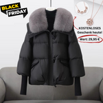 Black puffer jacket with gray faux fur collar, front zip and flap pockets
