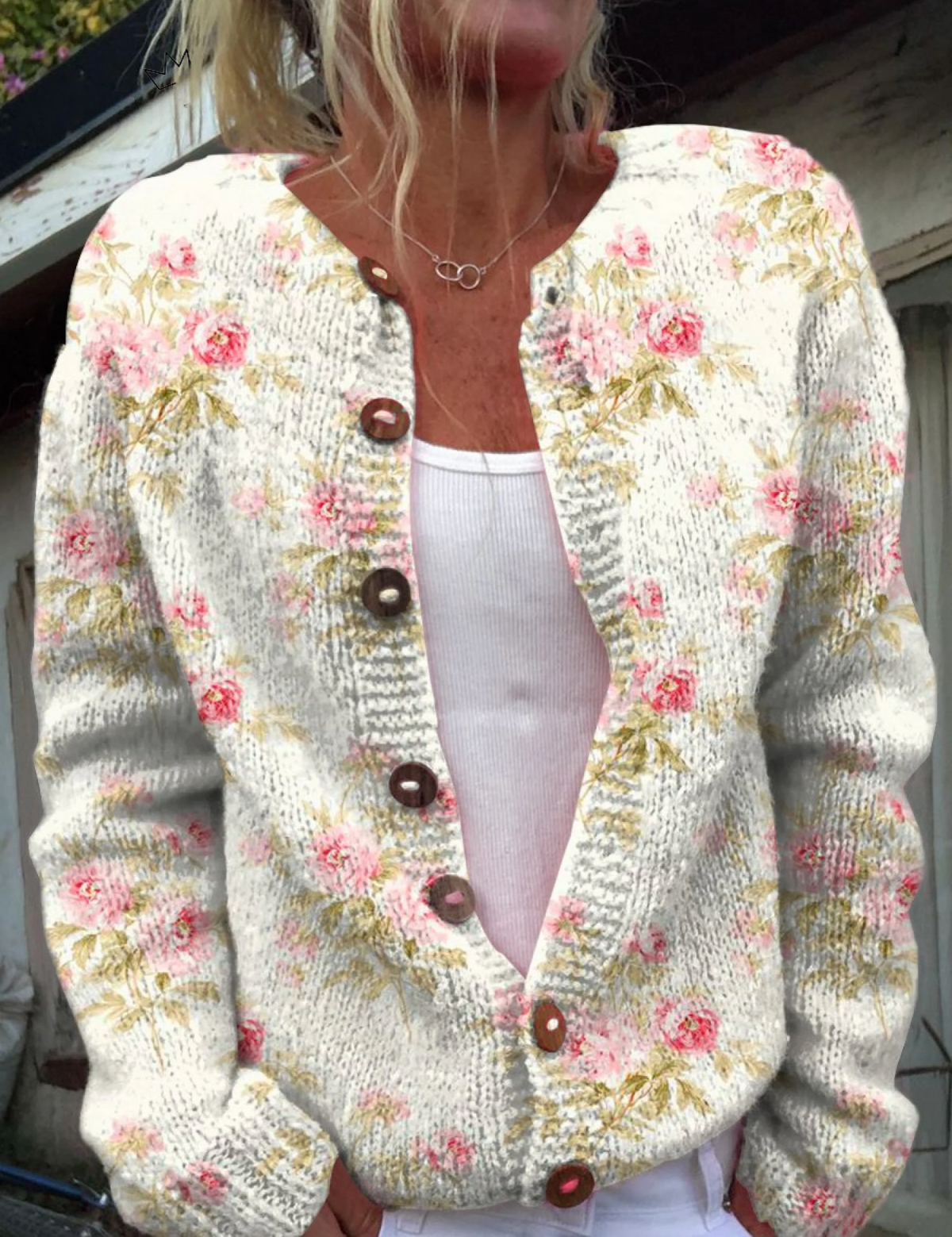 Cream knit button cardigan with pink floral print and green leaf details, V-neck