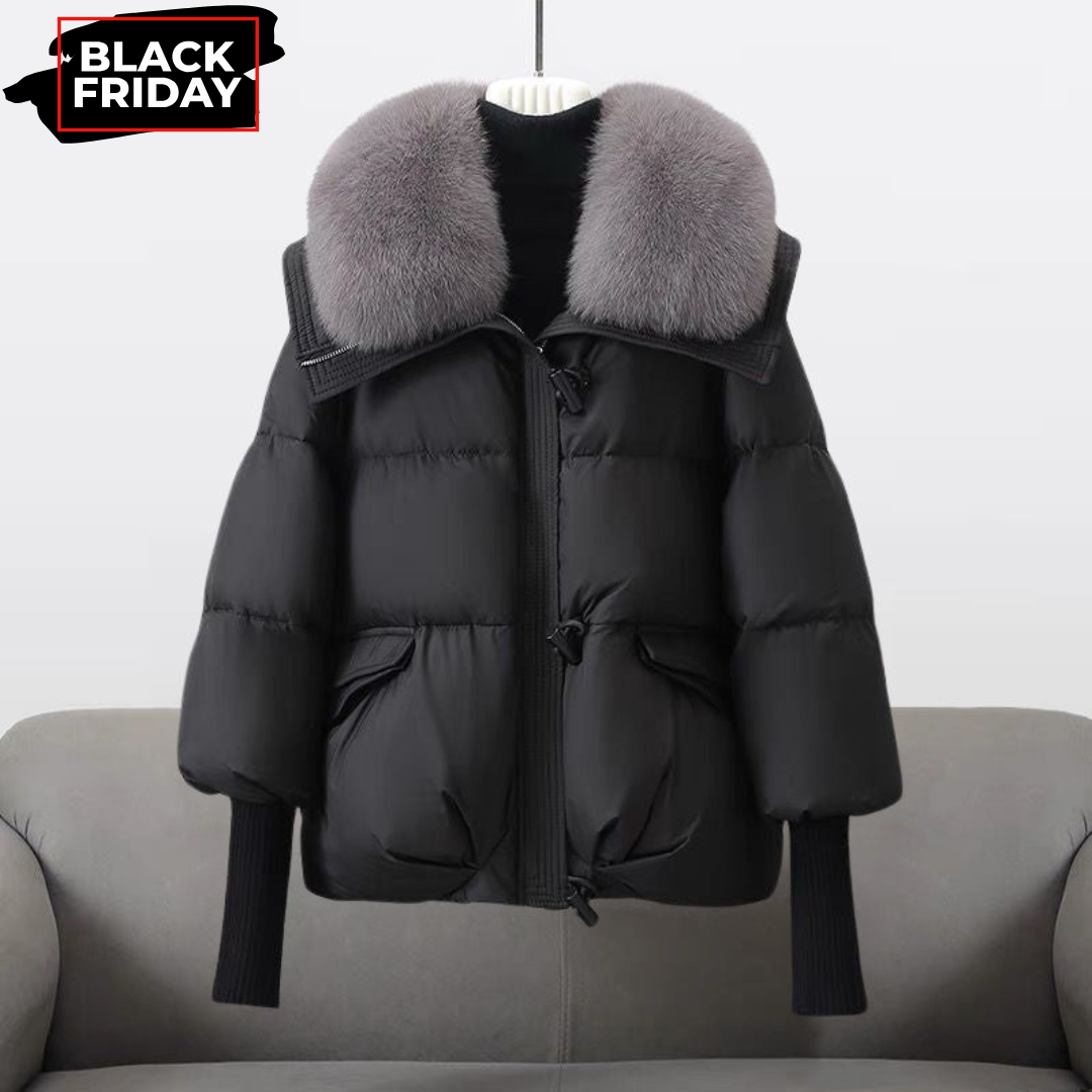 Black puffer jacket with gray faux fur collar, front zip and flap pockets