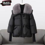 Black puffer jacket with gray faux fur collar, front zip and flap pockets