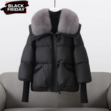 Black puffer jacket with gray faux fur collar, front zip and flap pockets