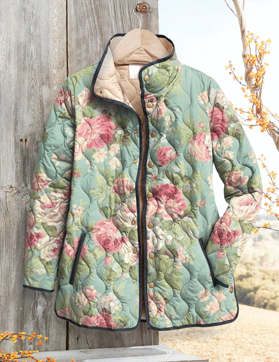Women’s quilted floral jacket with hood, front zipper, teal with pink rose print