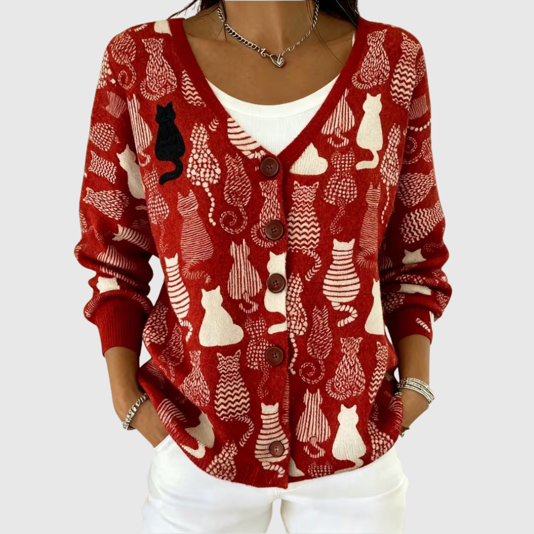 Red knit cardigan with cat pattern, button front, V-neck and long sleeves